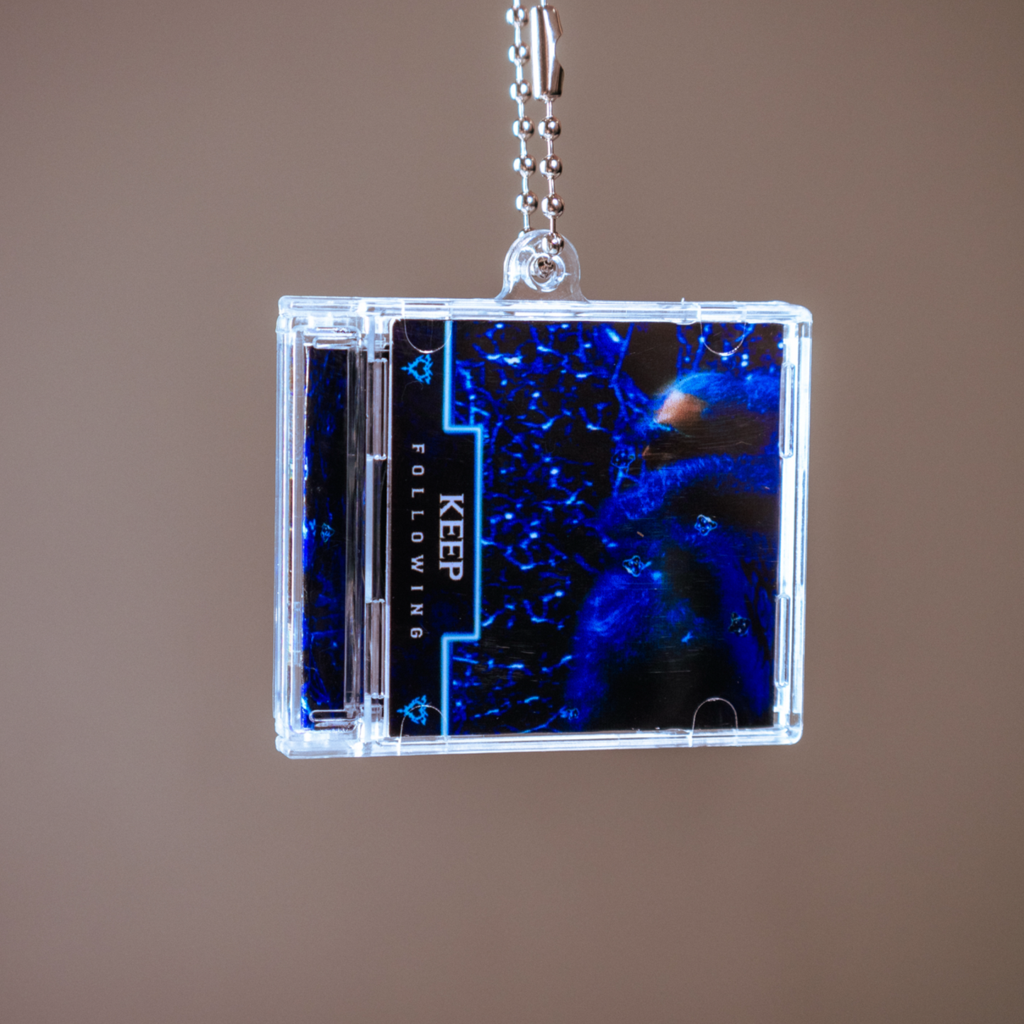 KEEP FOLLOWING KEYCHAIN
